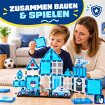 Eltern und Kind bauen gemeinsam mit den magnetischen Bausteinen Polizeipatrouillen-Hauptquartier