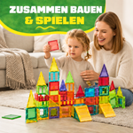 Eltern und Kind bauen gemeinsam mit den magnetischen Bausteinen Bauen & Mehr