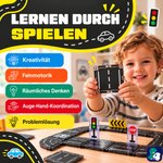 Kind spielt mit den magnetischen Bausteinen Road Trip Rally: gut für Kreativität, Feinmotorik und räumliches Denken