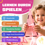 Kind spielt mit den magnetischen Bausteinen Prinzessinnenparadies: gut für Kreativität, Feinmotorik und räumliches Denken