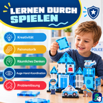Kind spielt mit den magnetischen Bausteinen Polizeipatrouillen-Hauptquartier: gut für Kreativität, Feinmotorik und räumliches Denken