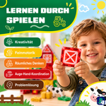 Kind spielt mit den magnetischen Bausteinen Bauernhof-Chaos: gut für Kreativität, Feinmotorik und räumliches Denken